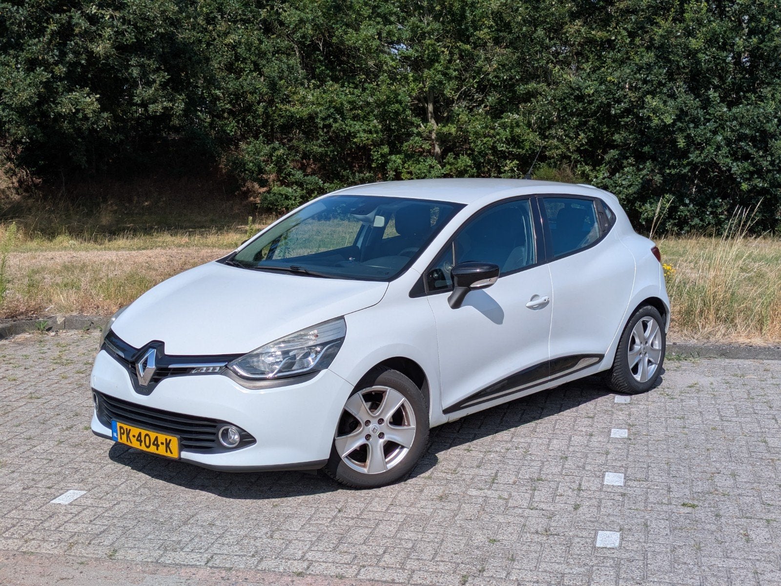 Renault Clio 1.2 54KW 5-DRS 2013 Wit, Auto's, Renault, Voorwielaandrijving, 1200 kg, Handgeschakeld, Particulier
