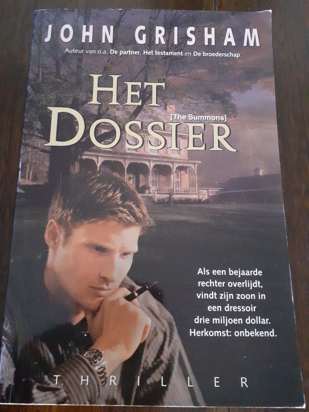 Het dossier - John Grisham -, Ophalen of Verzenden, Gelezen, John Grisham