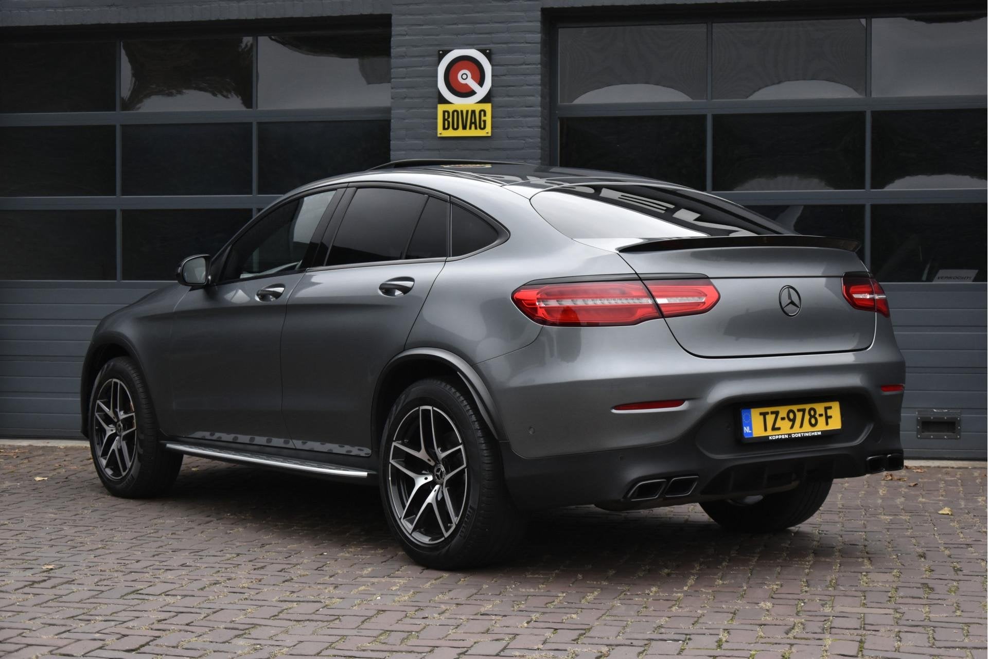 Mercedes-Benz GLC Coupé 250 4MATIC Premium Plus AMG, Auto's, 12 maanden, Gebruikt, 4 cilinders, Leder en Stof
