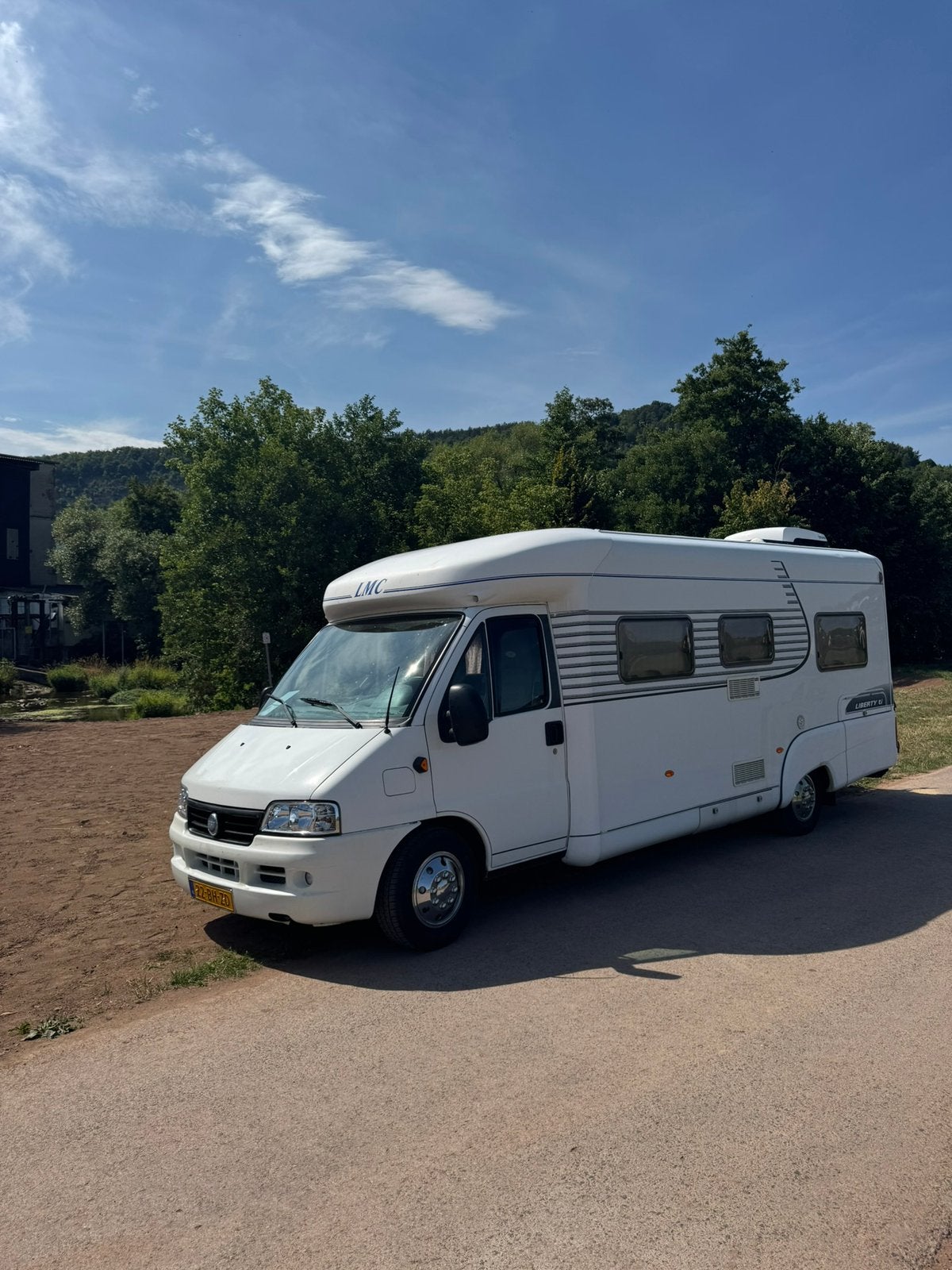 LMC Liberty 6800 Ti - Ruime Half-integraal Camper 2003, Ringverwarming, Fiat, 6 tot 7 meter, Boiler