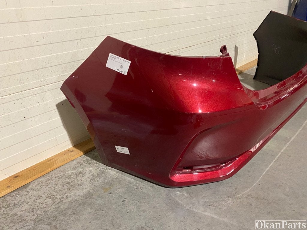 Toyota Corolla Sedan achterbumper 52159-02E60, Gebruikt, Ophalen of Verzenden, Toyota, Achter