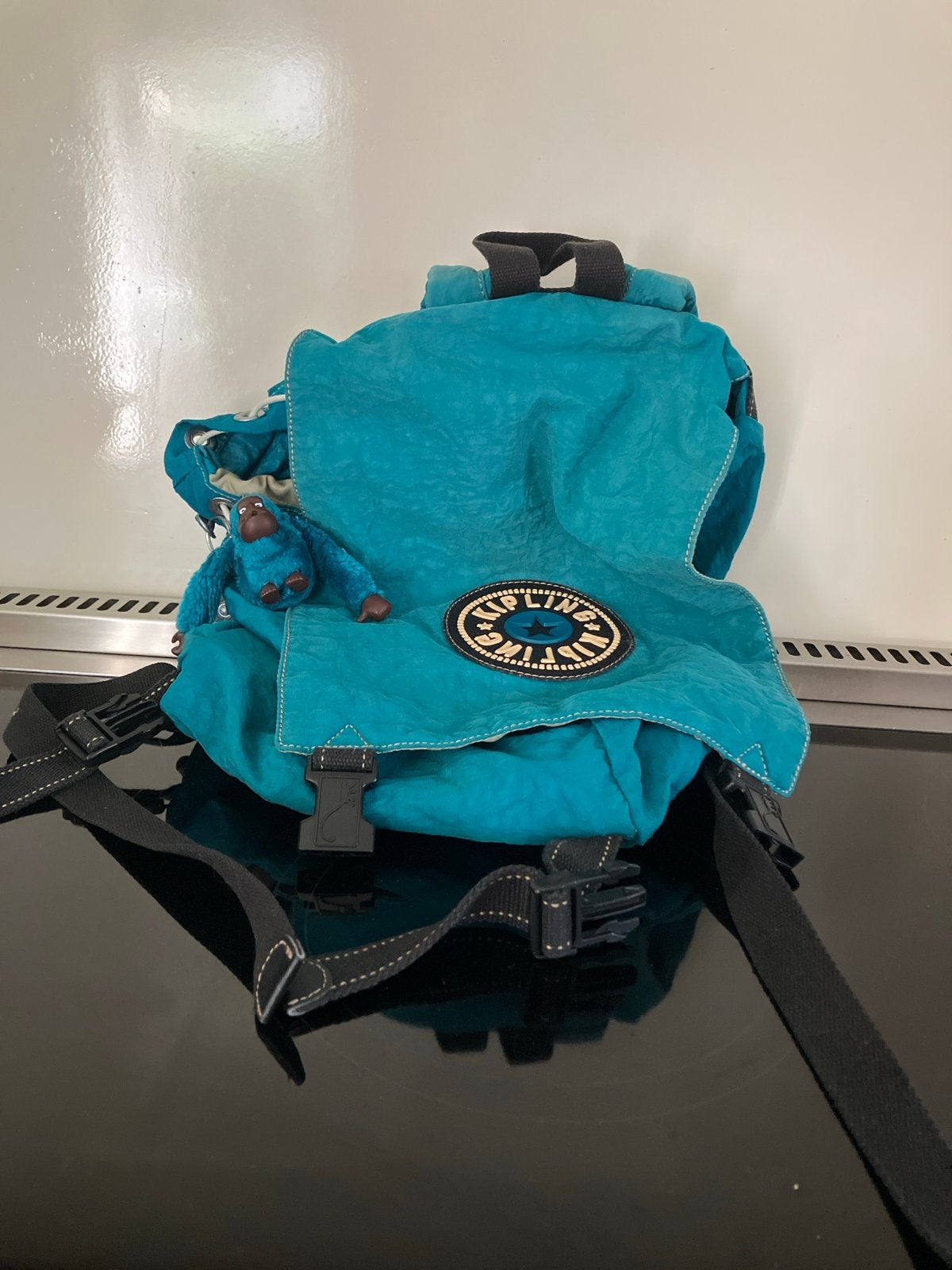 Kipling Mini Rugzak - Turquoise met Aapje, Sieraden, Tassen en Uiterlijk, Tassen | Rugtassen, Ophalen, Gebruikt, Minder dan 25 cm