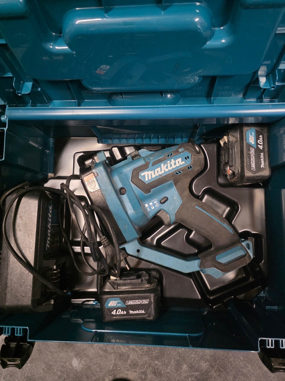 Makita DSC102ZJ 14,4 V  Draadeindschaar, Ophalen