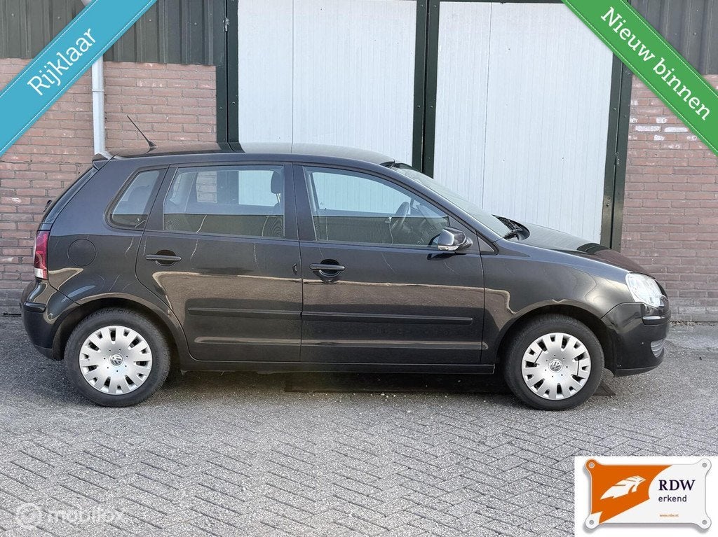 Volkswagen Polo 1.4-16V Comfortline NAP/AIRCO/NETTE AUTO/RUI, Auto's, Voorwielaandrijving, Zwart, Origineel Nederlands, Handgeschakeld