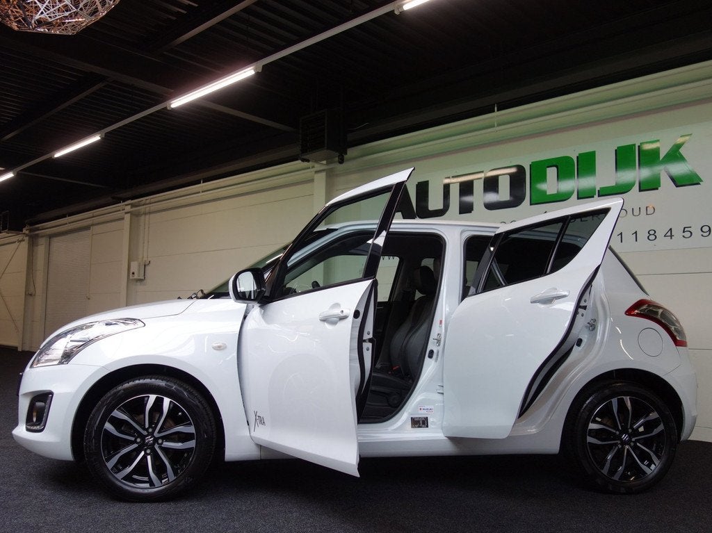 Suzuki Swift 1.2 X-tra Edition |Carplay|Alcantara|PDC|Navi, Auto's, Suzuki, Voorwielaandrijving, 94 pk, Gebruikt, 4 cilinders