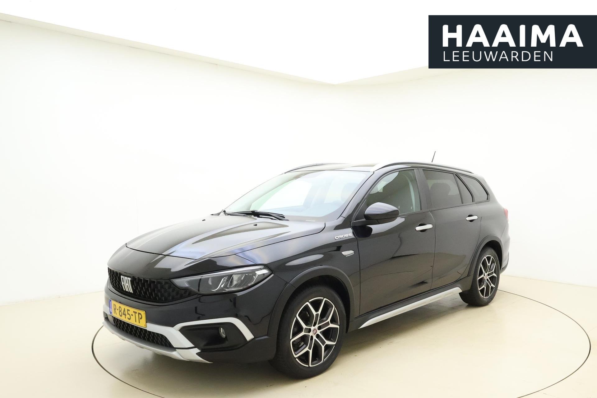 Fiat Tipo Stationwagon Cross 1.5 Hybrid Automaat | Navigatie, Auto's, Gebruikt, Euro 6, 4 cilinders, Leder en Stof