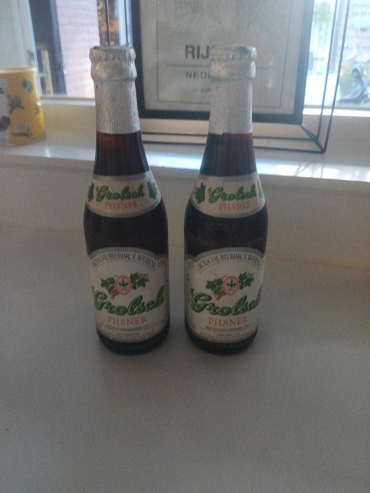 2 ongeopende Grolsch pils flesjes uit 1983, Ophalen of Verzenden, Nieuw, Flesje(s), Grolsch
