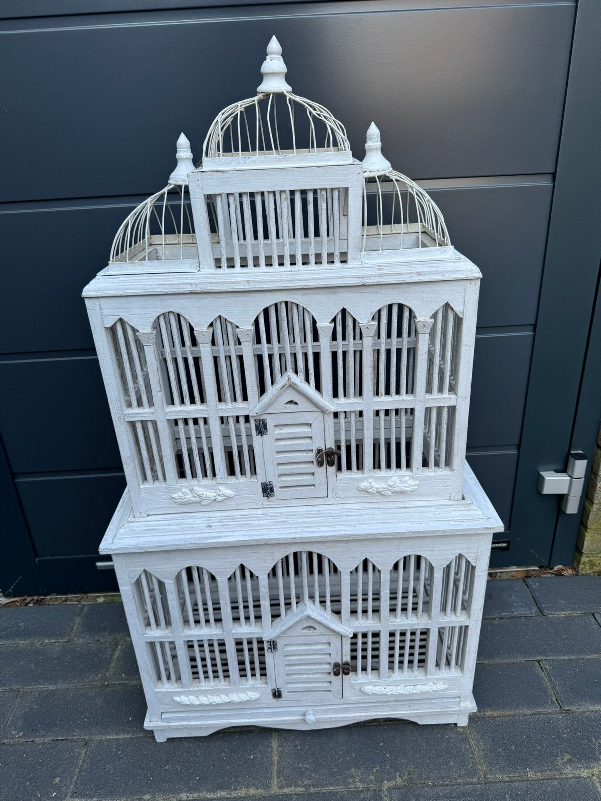 Grote witte brocante vogelkooi, Ophalen