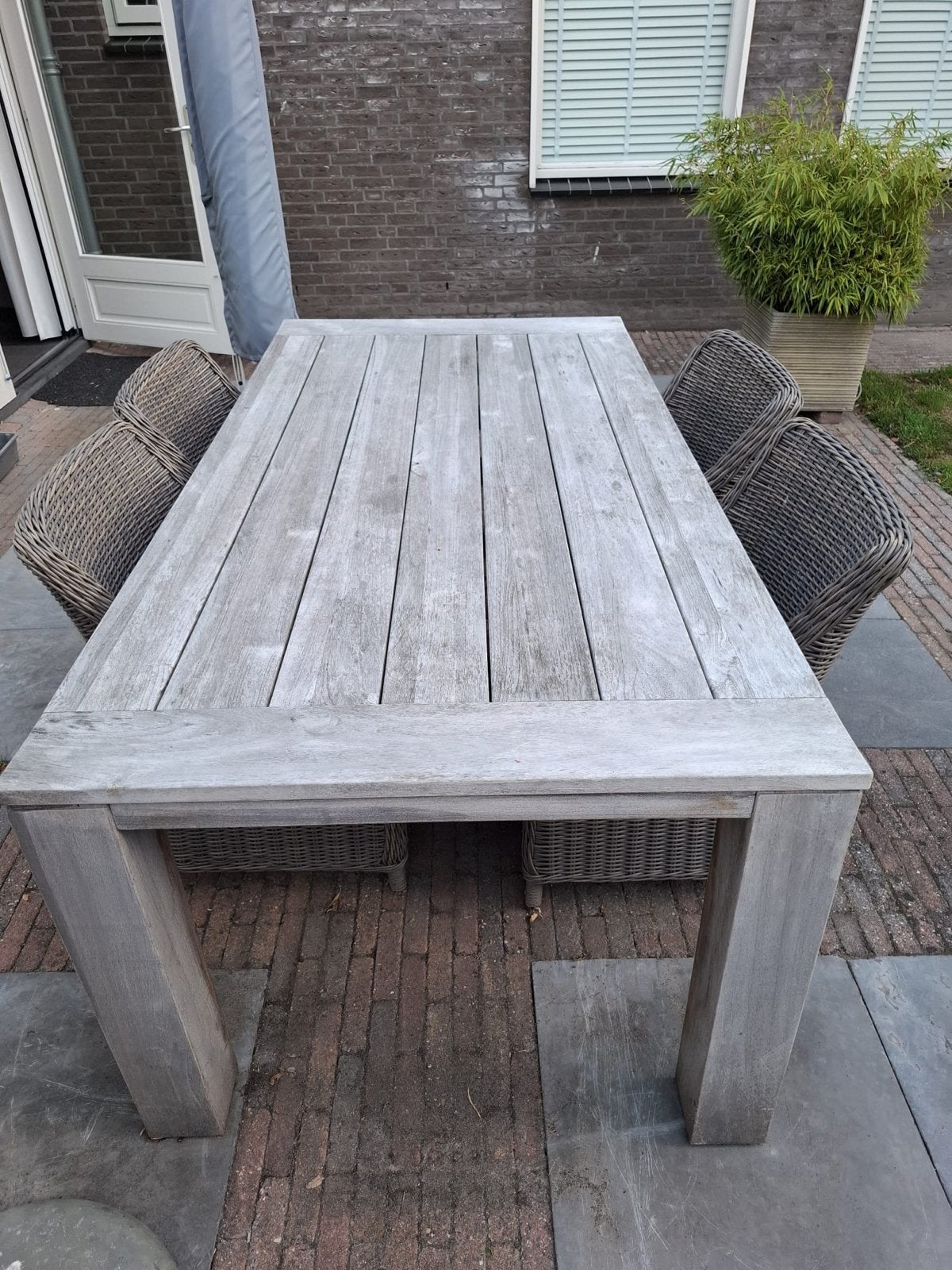 Teakhouten tuintafel met 4 wicker stoelen T.e.a.b., Ophalen, Gebruikt, Rechthoekig, Teakhout