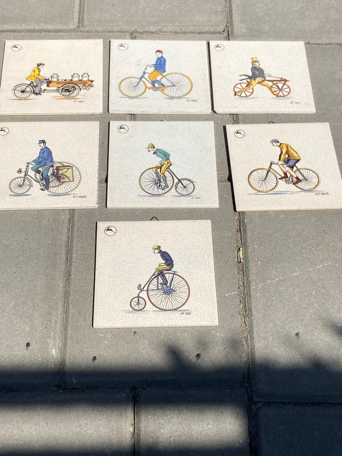 Set van 7 vintage tegels gazelle fietsen door de jaren heen, Antiek en Kunst, Ophalen of Verzenden