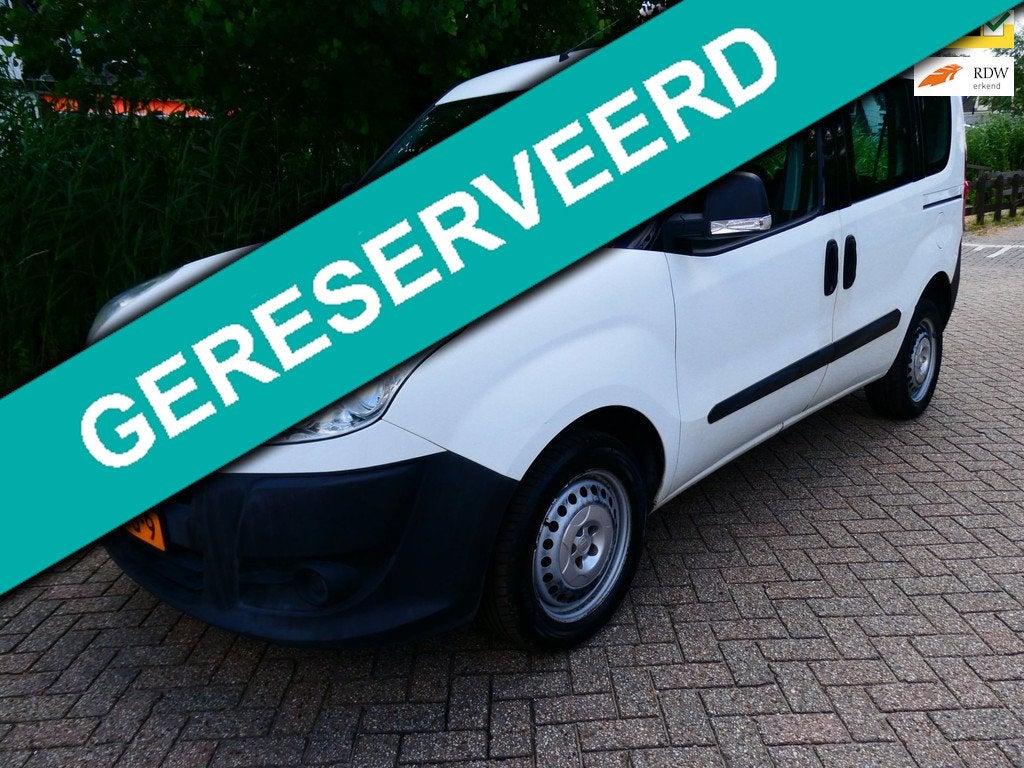 Fiat Doblò 1.4i 95pk 2e eig. Trekhaak 2-Schuifdeuren Ruimte, Auto's, Fiat, Voorwielaandrijving, Euro 5, Stof, Gebruikt