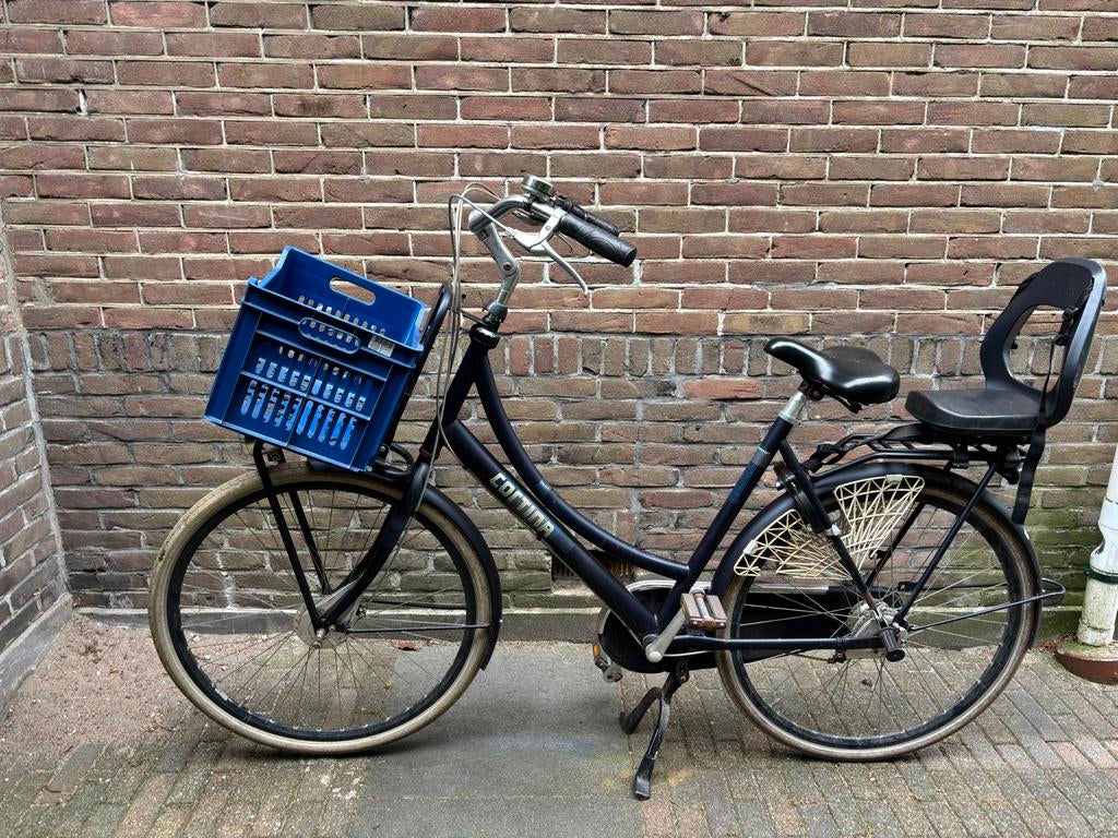 Cortina moederfiets met kinderzitje en mandje, Terugtraprem, Dubbele standaard, 1 zitje, Ophalen