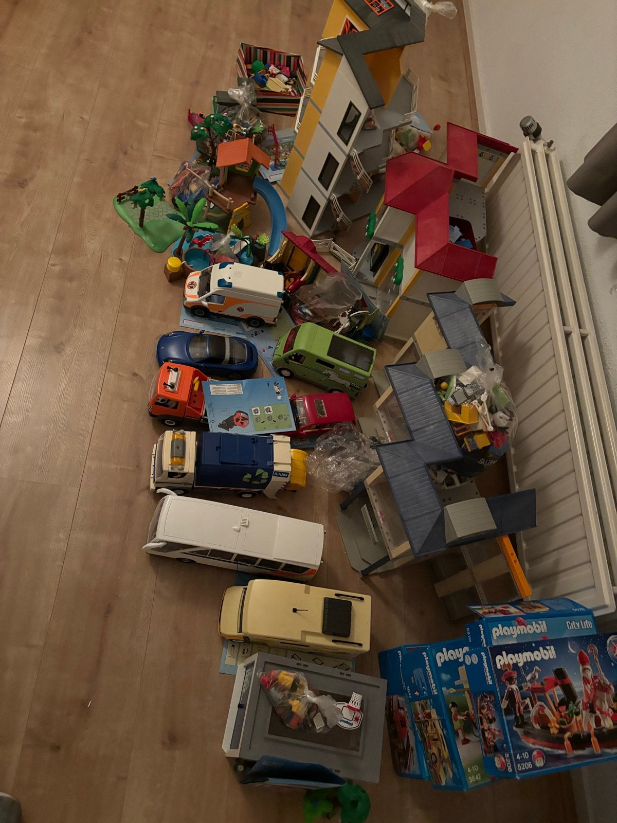 Foto 3 van Grote Playmobil collectie: huizen, voertuigen en meer!