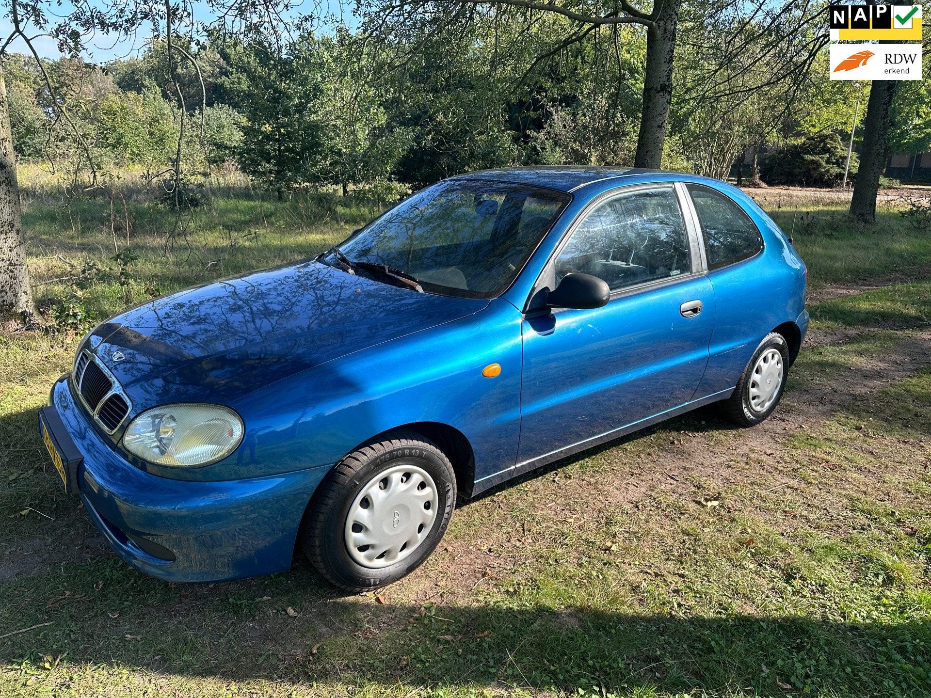 Daewoo Lanos 1.5 SE APK 30-09-2027, Auto's, 86 pk, 4 cilinders, Blauw, Origineel Nederlands