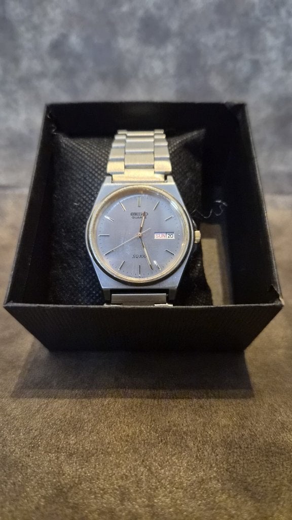 Refurbished vintage Seiko SQ100 (1986), Staal, Polshorloge, Ophalen of Verzenden, Zo goed als nieuw