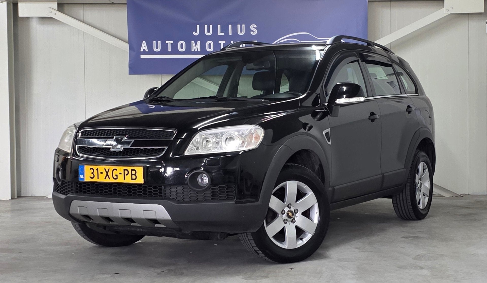 Chevrolet Captiva 2.4i 7P Executive Volledig Onderhouden Lee, Auto's, 136 pk, Gebruikt, Zwart, 4 cilinders