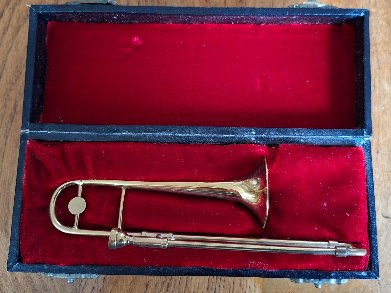 miniatuur trombone koper, Ophalen, Koper