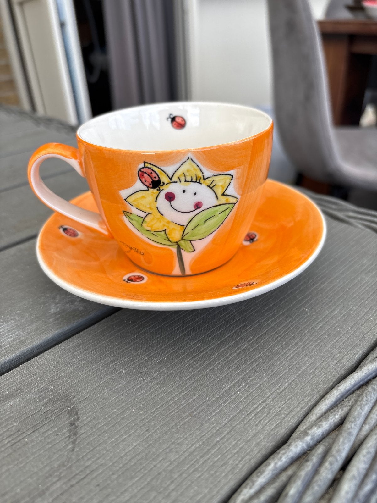 Mila Design kop en schotel met zonnebloem en lieveheersbeest, Overige merken, Keramiek, Ophalen of Verzenden, Zo goed als nieuw