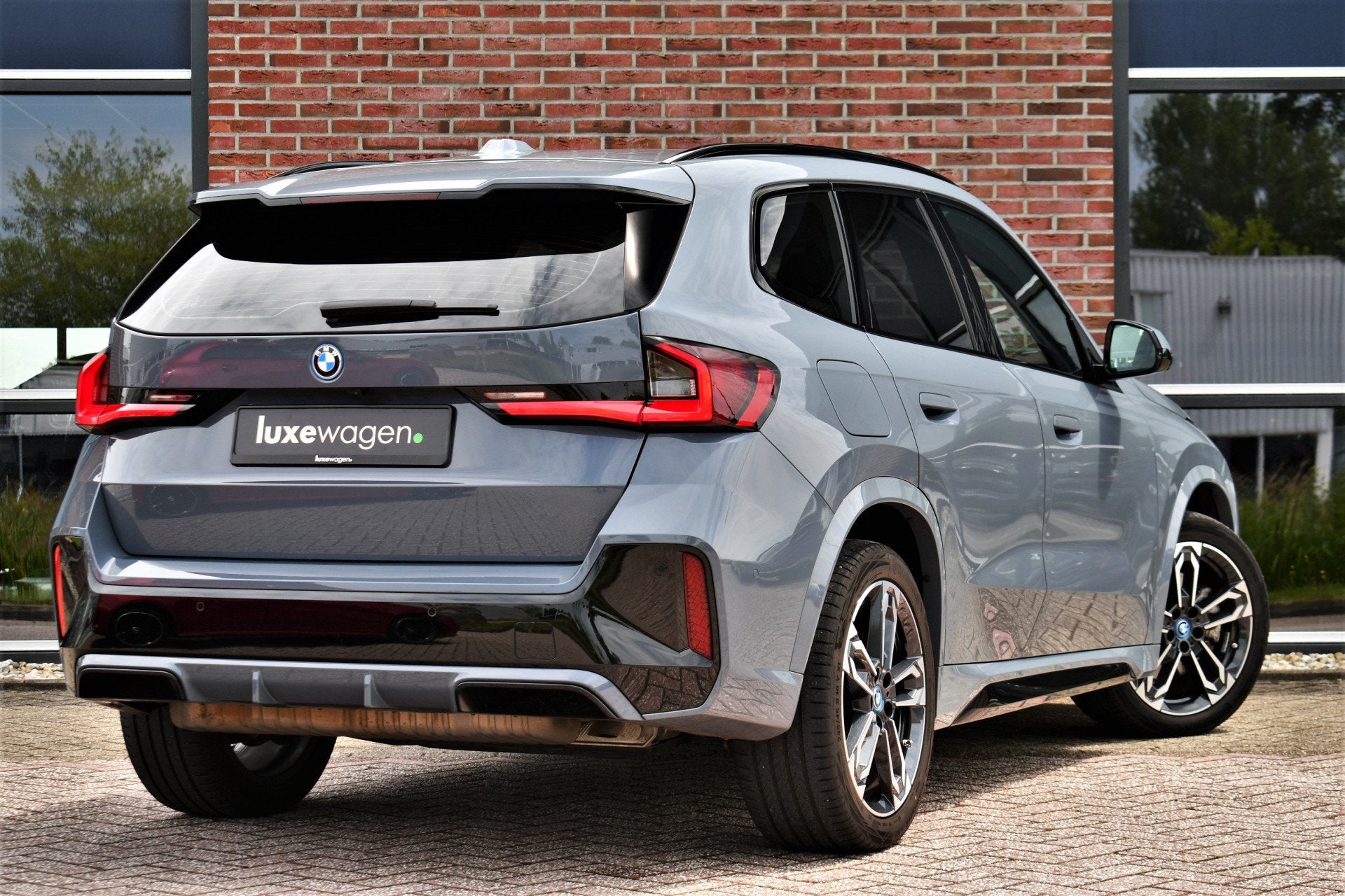 BMW X1 xDrive30e M-Sport Plus Stormbay Pano ACC HUD 360-cam, 12 maanden, Vierwielaandrijving, Hybride Elektrisch/Benzine, 3 cilinders