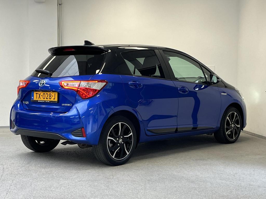 Toyota Yaris 1.5 Hybrid Bi-Tone | CAMERA | NAVI | CLIMA | 2e, Auto's, Gebruikt, 4 cilinders, Met garantie (alle), Blauw