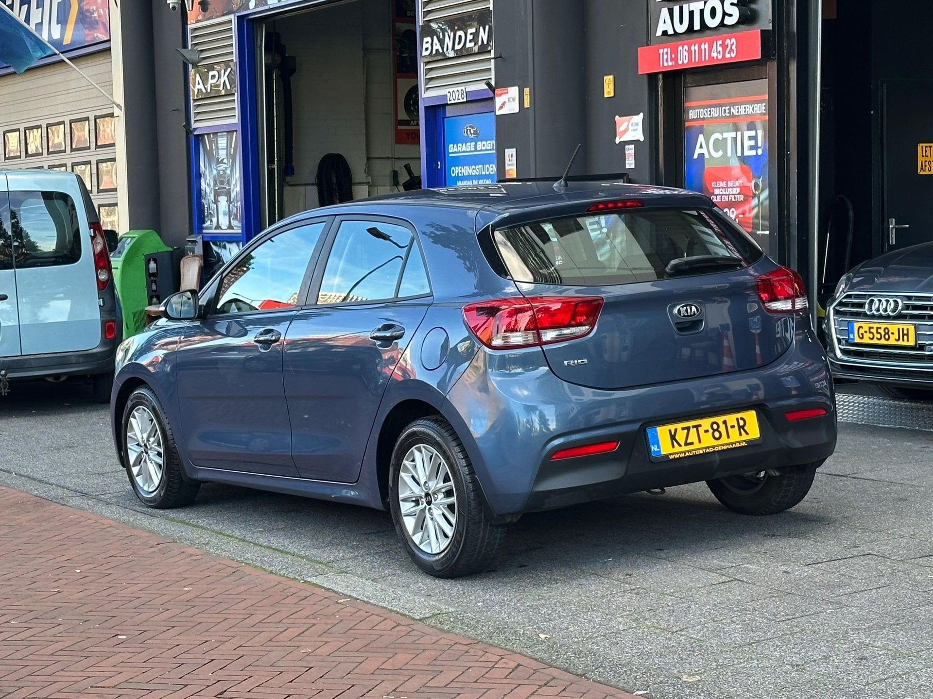 Kia Rio 1.4 DynamicLine Automaat 5 Deurs Airco, Auto's, Gebruikt, Euro 6, 4 cilinders, Blauw