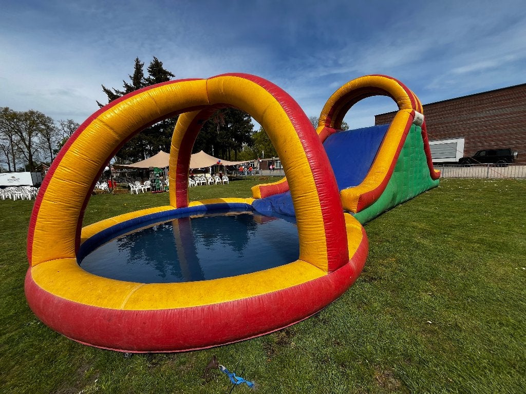 Professionele Tobbedansbaan 18 meter | Sidijk incl. blowers, Kinderen en Baby's, Speelgoed | Buiten | Springkussens, Ophalen, Gebruikt