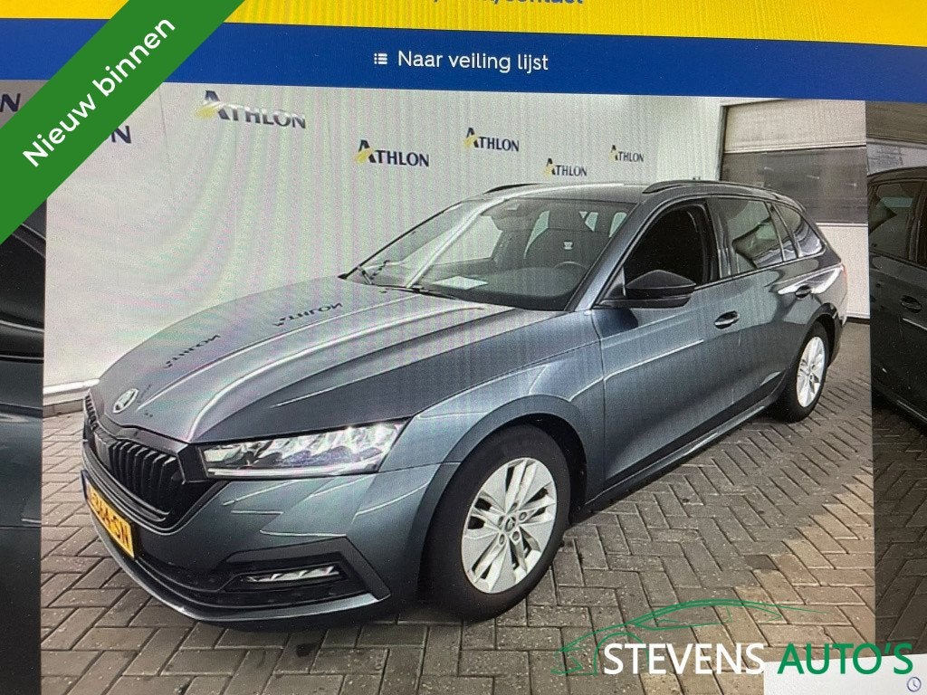 Skoda Octavia Combi 1.0 e-TSI Sport Bns Automaat TREKHAAK /, Auto's, Automaat, Stof, Gebruikt, 23 km/l