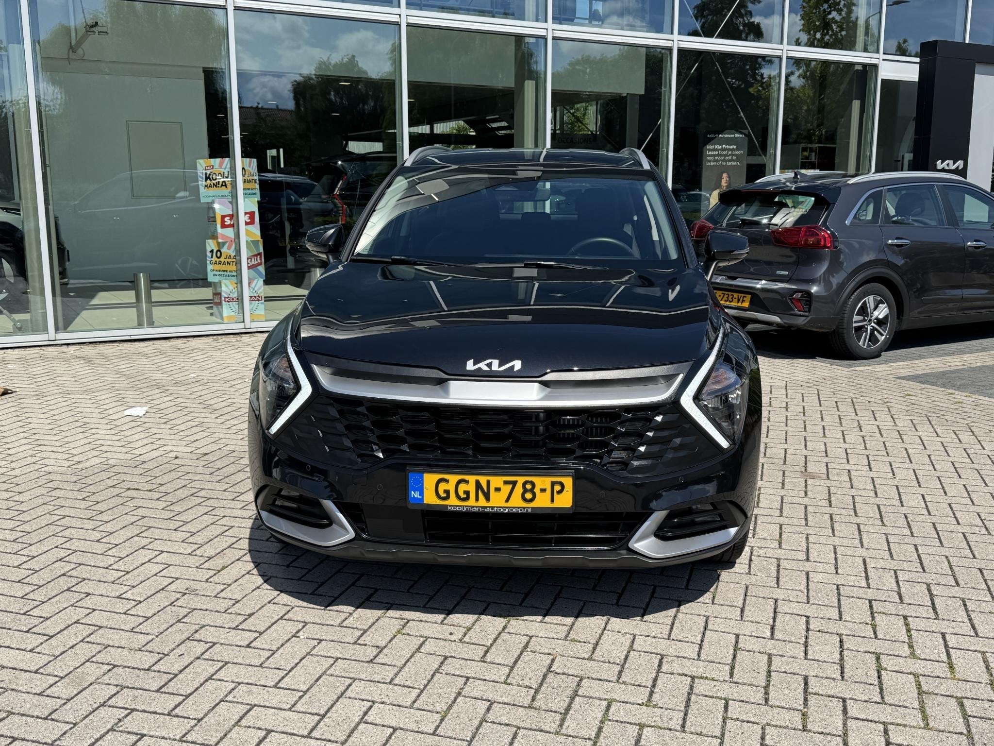 Kia Sportage 1.6 T-GDi Hybrid DynamicLine Nav|Camera|Lmv, Auto's, Kia, Stof, Gebruikt, Euro 6, 4 cilinders