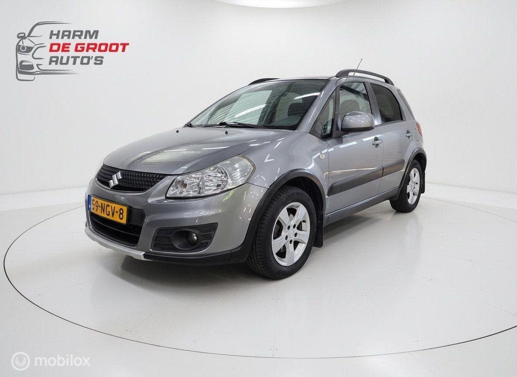 Suzuki SX4 1.6 Exclusive Automaat/Keyless/Cruise/Trekhaak, Auto's, Euro 5, Gebruikt, 4 cilinders, Stoelverwarming