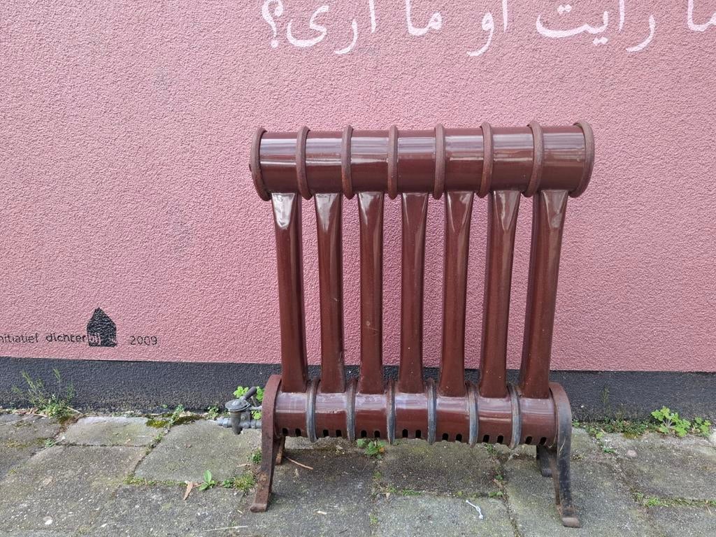 Antieke gietijzeren radiator gaskachel, Ophalen