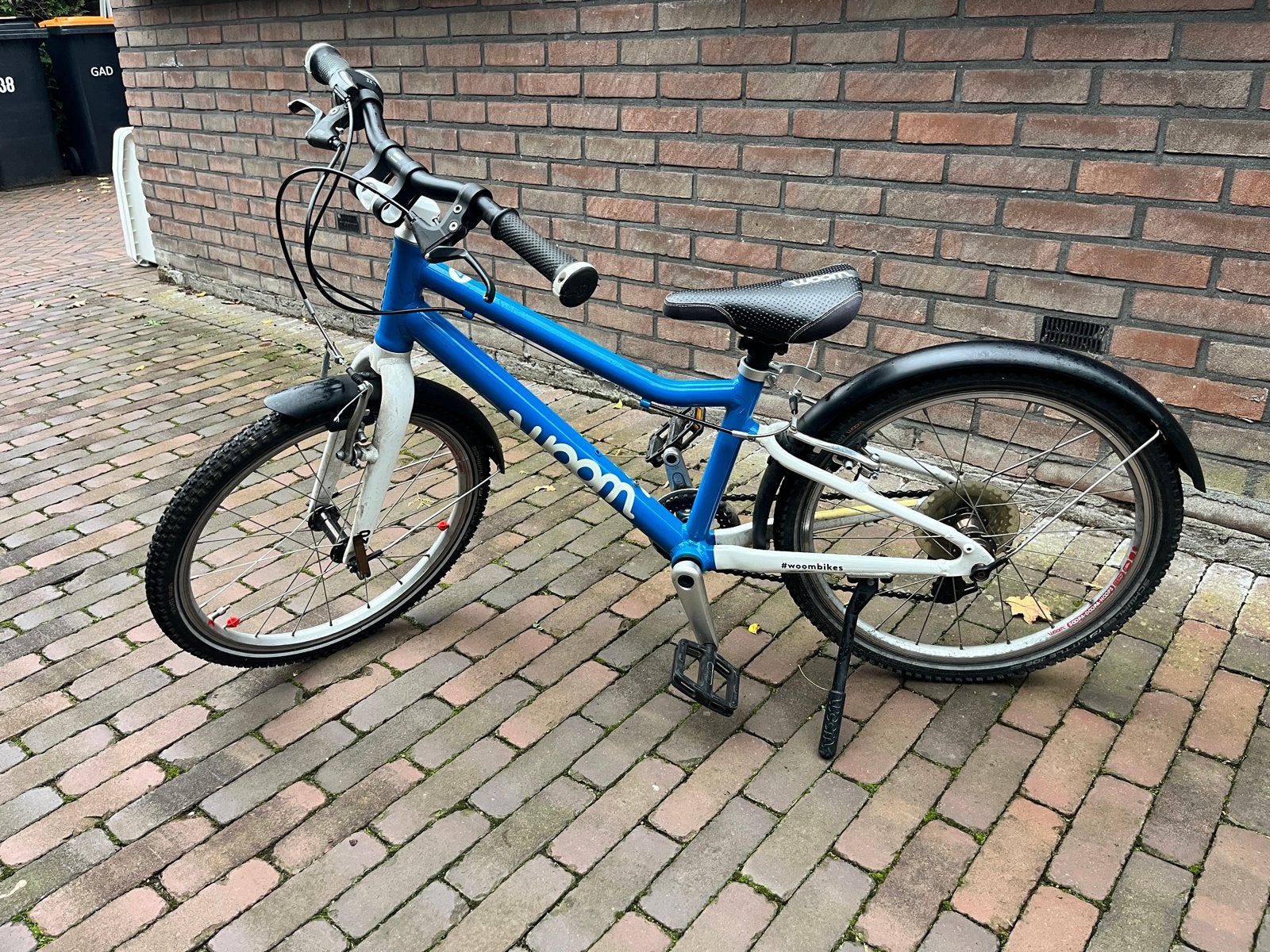 Woom 4 kinderfiets - Blauw, Ophalen, Gebruikt, Velgrem, 20 inch of meer