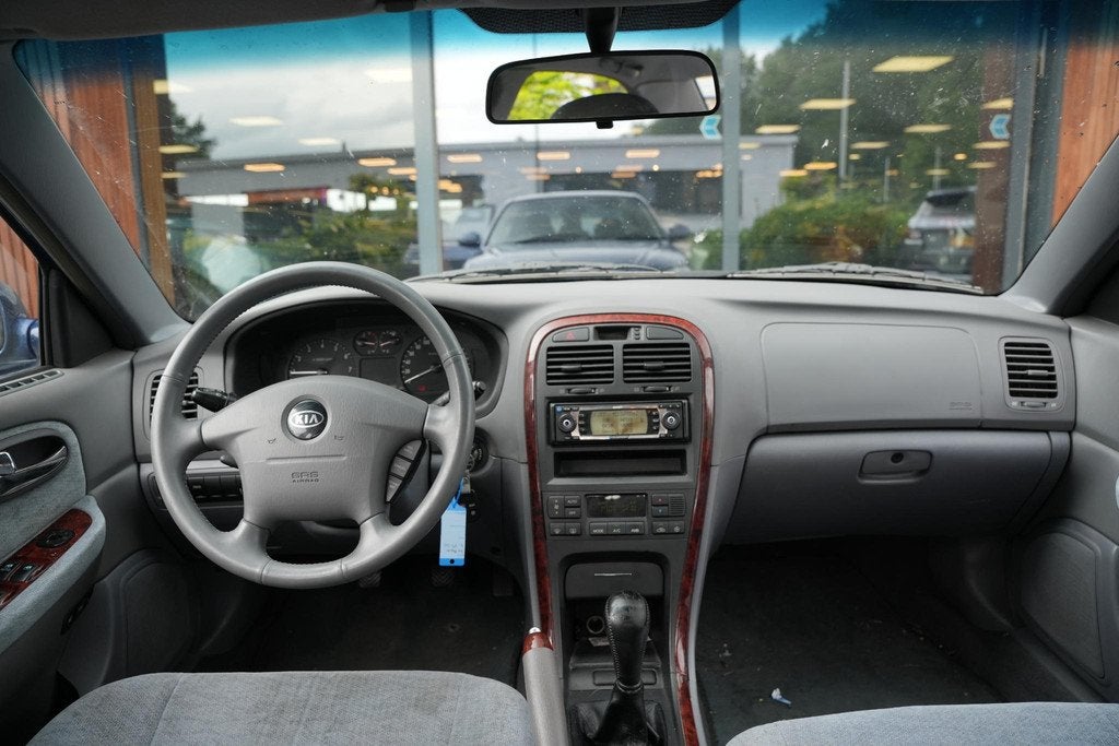 Kia Magentis 2.0 X-treme Cruise control Mistlampen voor Clim, Auto's, Kia, Voorwielaandrijving, Gebruikt, Blauw, Magentis