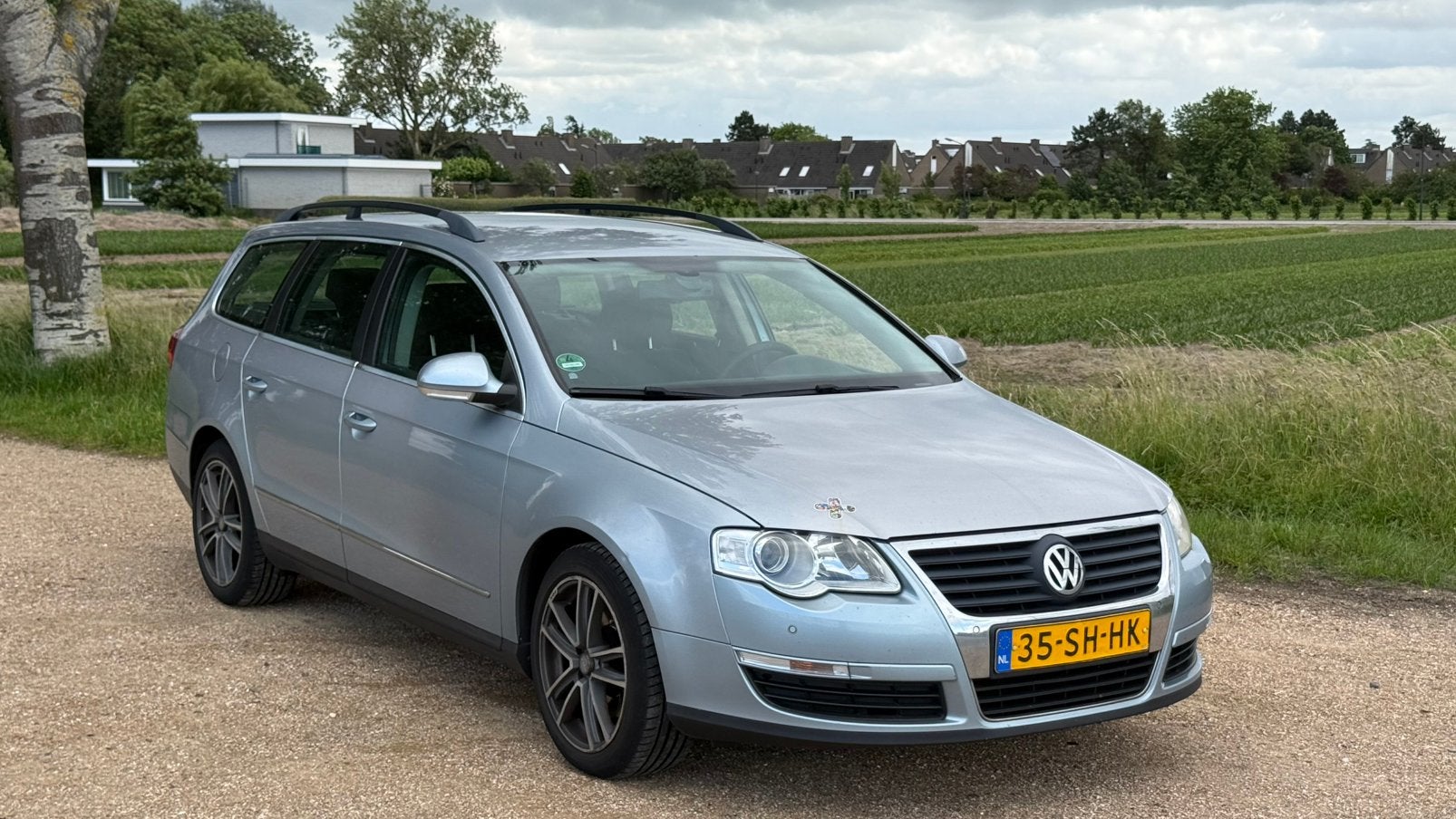 Volkswagen Passat 1.6 FSI 85KW Variant AUT 2006 Blauw, Auto's, Volkswagen, Zwart, 4 cilinders, 700 kg, Blauw