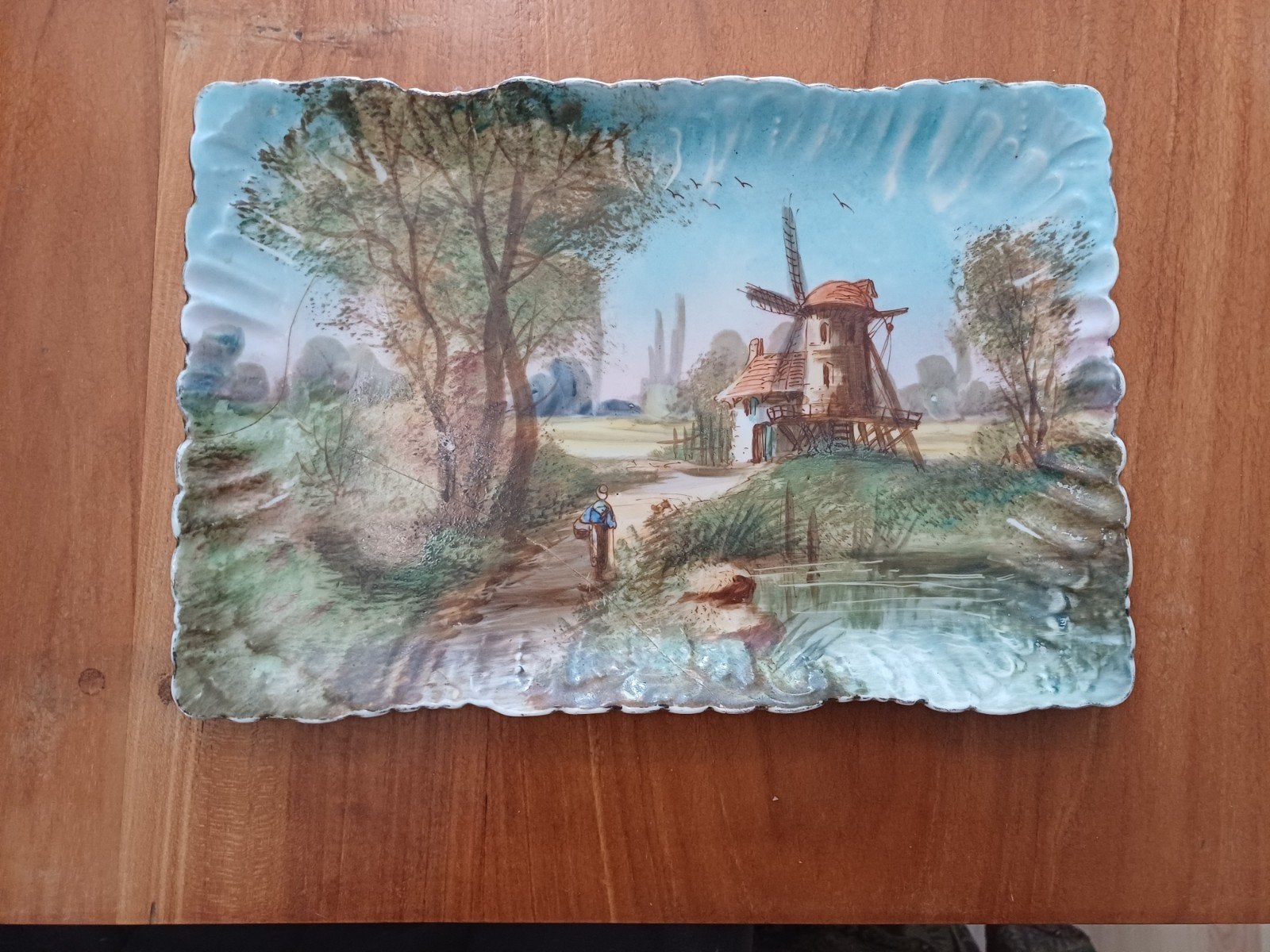 Antieke schaal met molenlandschap, Ophalen
