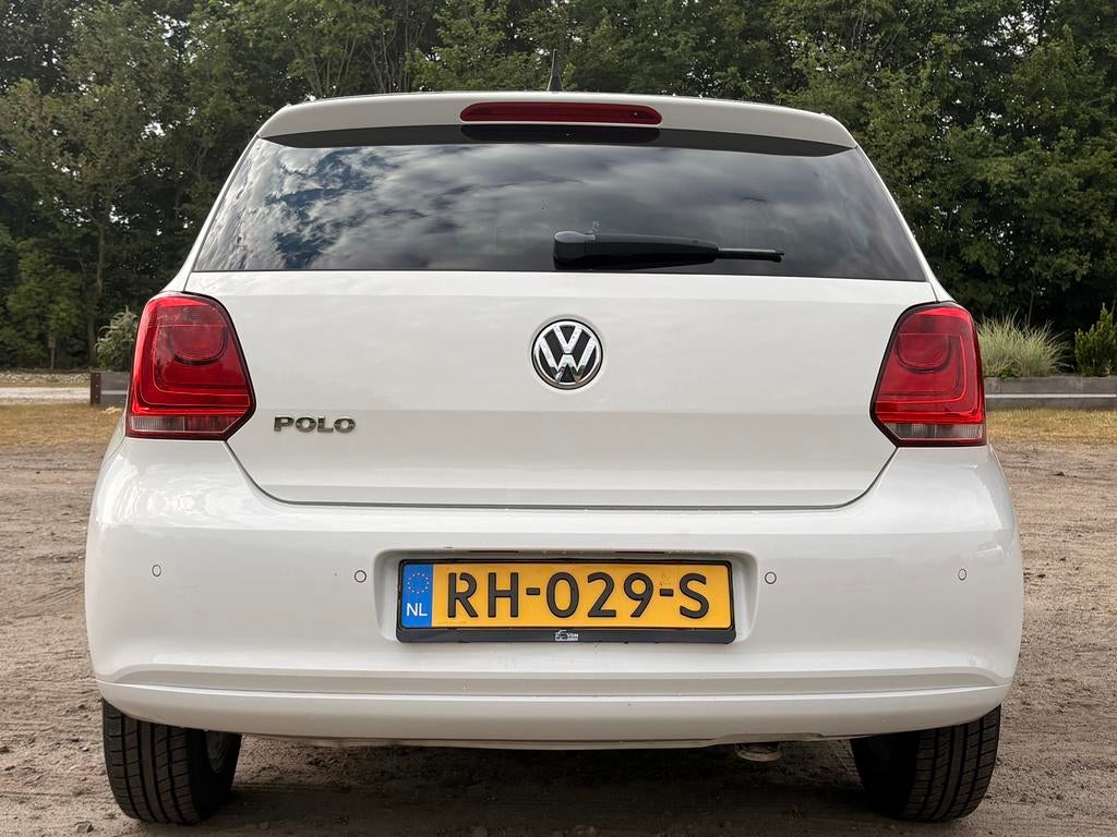 Volkswagen Polo 1.2 2012 stoelverwarming Cruise control, Auto's, Voorwielaandrijving, 967 kg, 40 €/maand, Zwart