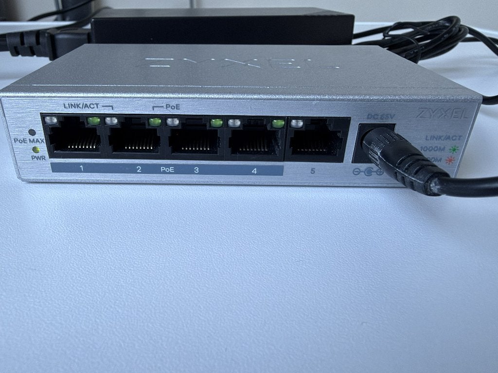 Zyxel GS1005HP 5-poorts Gigabit PoE+ Switch (60W), Computers en Software, Ophalen of Verzenden, Zo goed als nieuw