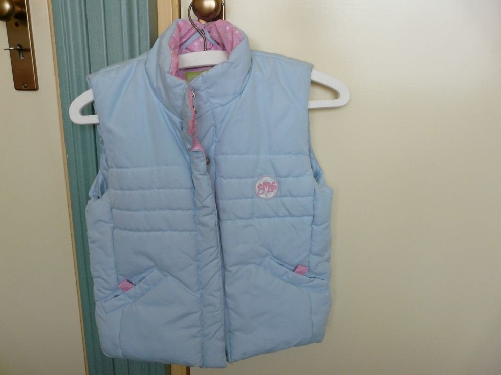 bodywarmer / vest nieuw , mt 128 , kleur lichtblauw, Ophalen of Verzenden, Zo goed als nieuw, Meisje, Trui of Vest