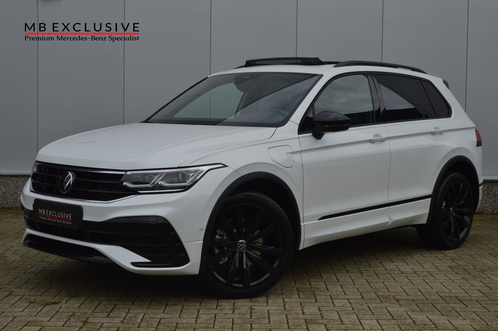 Volkswagen Tiguan 1.4 TSI eHybrid 3x R-Line Black Style DSG, Auto's, Zwart, 4 cilinders, Hybride Elektrisch/Benzine, SUV of Terreinwagen