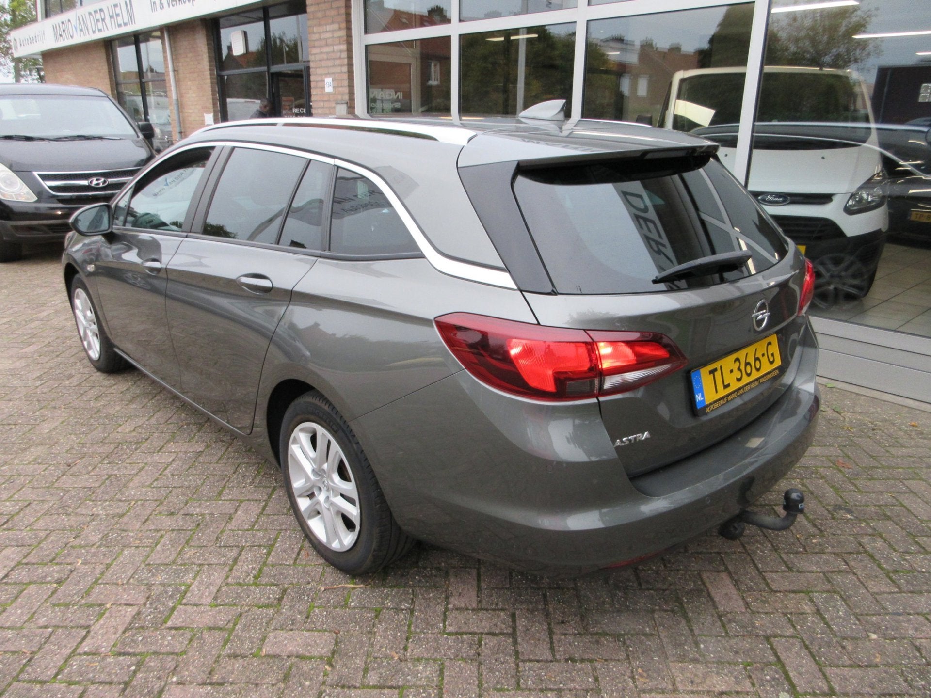 Opel Astra Sports Tourer 1.0 Online Edition Airco/Navigatie, Auto's, Voorwielaandrijving, Stof, Gebruikt, 1178 kg