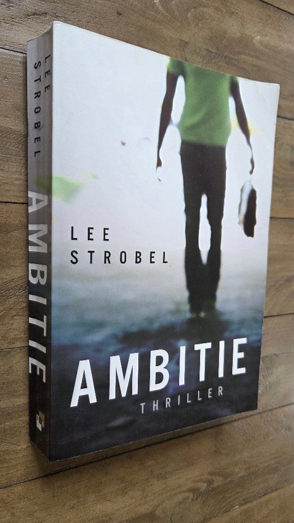 Ambitie - Lee Strobel (christelijke thriller), Boeken, Ophalen of Verzenden, Zo goed als nieuw