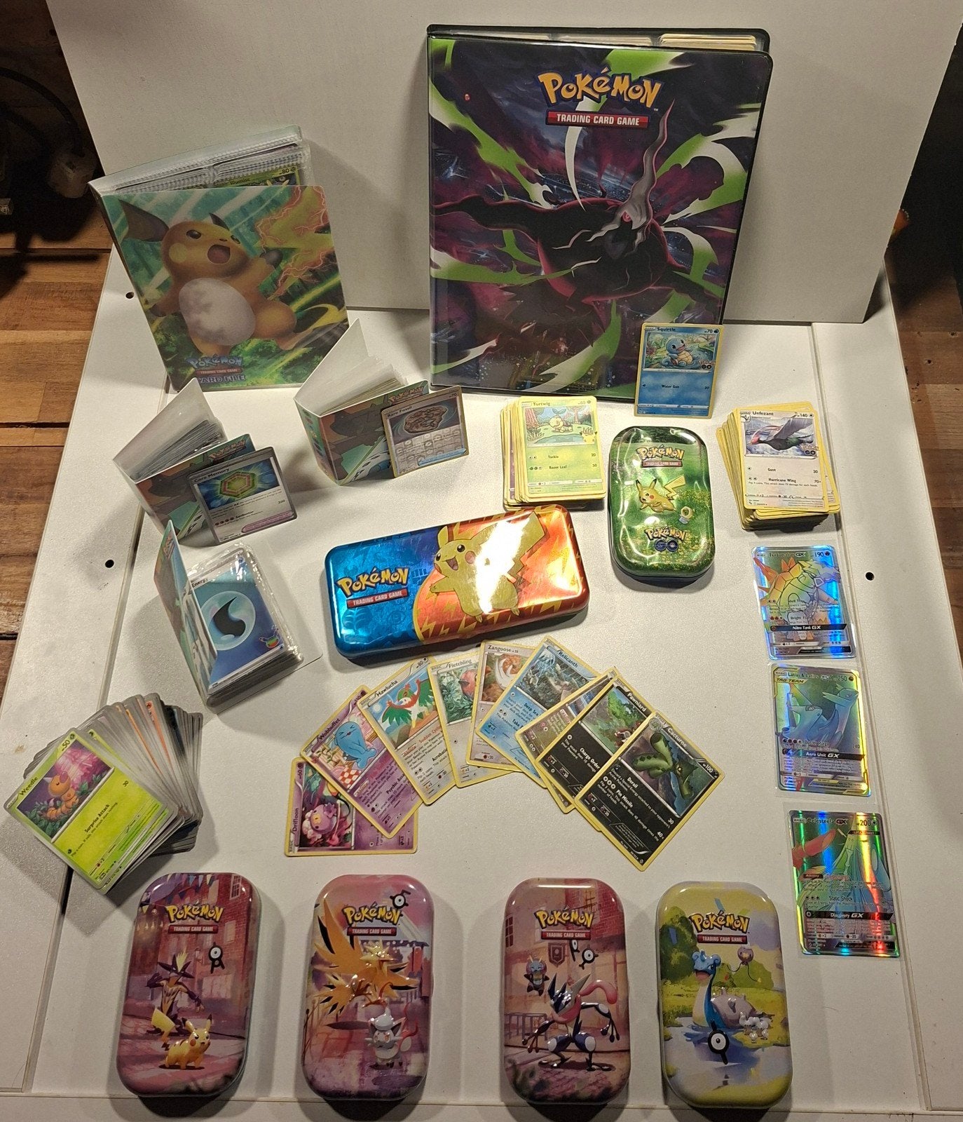 Grote collectie Pokémon kaarten in map en blikken, Ophalen of Verzenden, Zo goed als nieuw, Meerdere kaarten, Foil