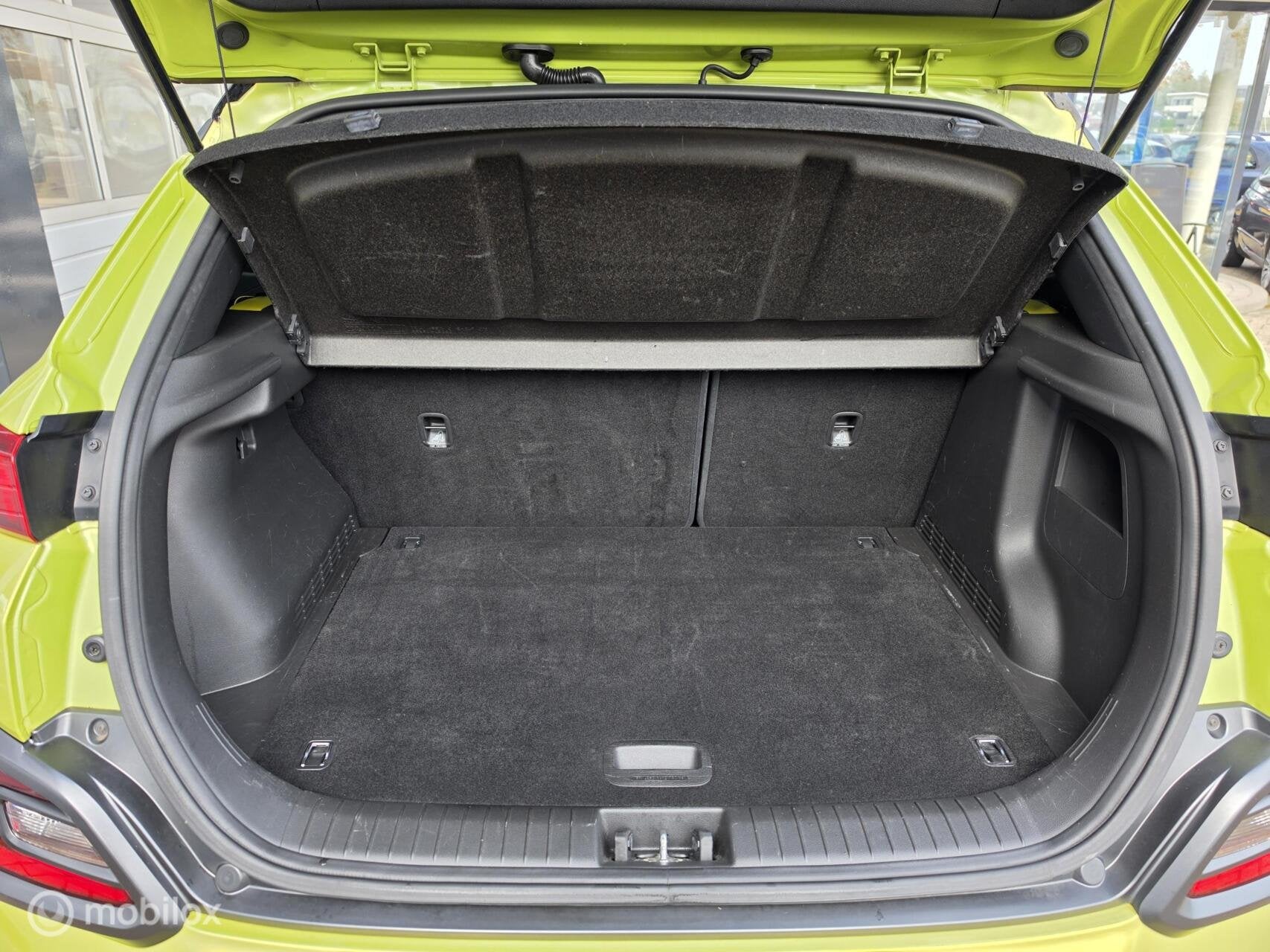 Hyundai Kona 1.0T Fashion APPLE CARPLAY HALF LEDER NAP, Auto's, Voorwielaandrijving, Dealer onderhouden, Euro 6, Leder en Stof