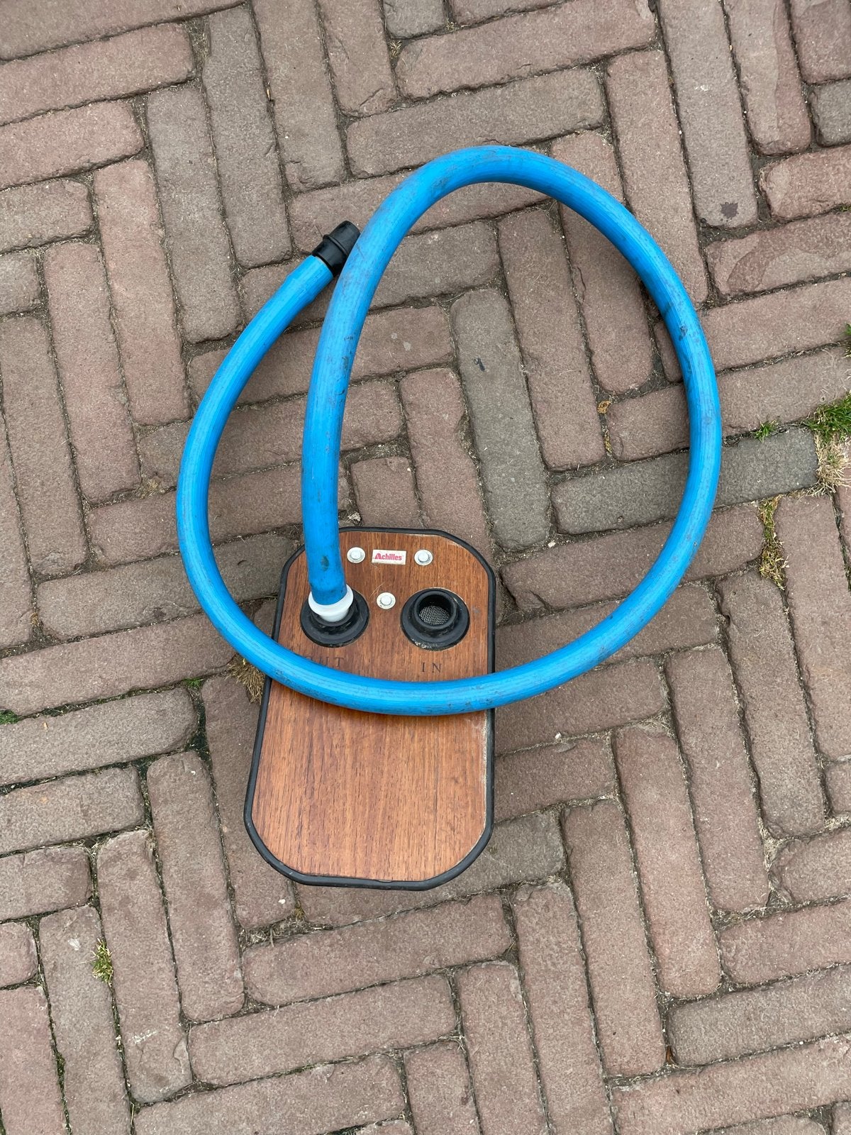 Foto 7 van Achilles rubberboot met peddels en houten vloer