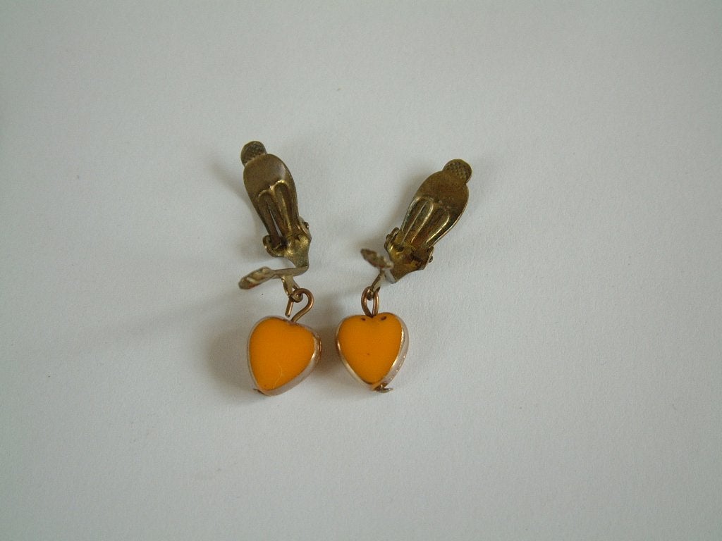bijzondere oude oorbellen gele hartjes clips, Overige materialen, Geel, Ophalen of Verzenden, Hangers