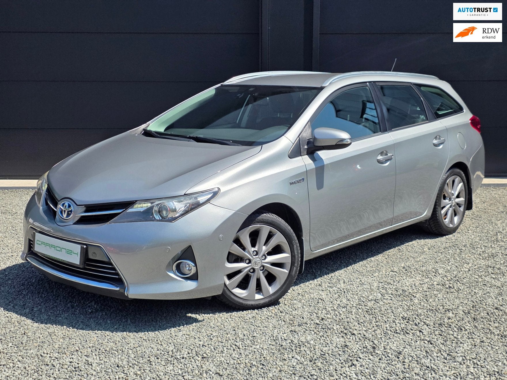 Toyota Auris TS 1.8 Hybrid Lease Pro, Euro 5, Zwart, Leder en Stof, 26 km/l