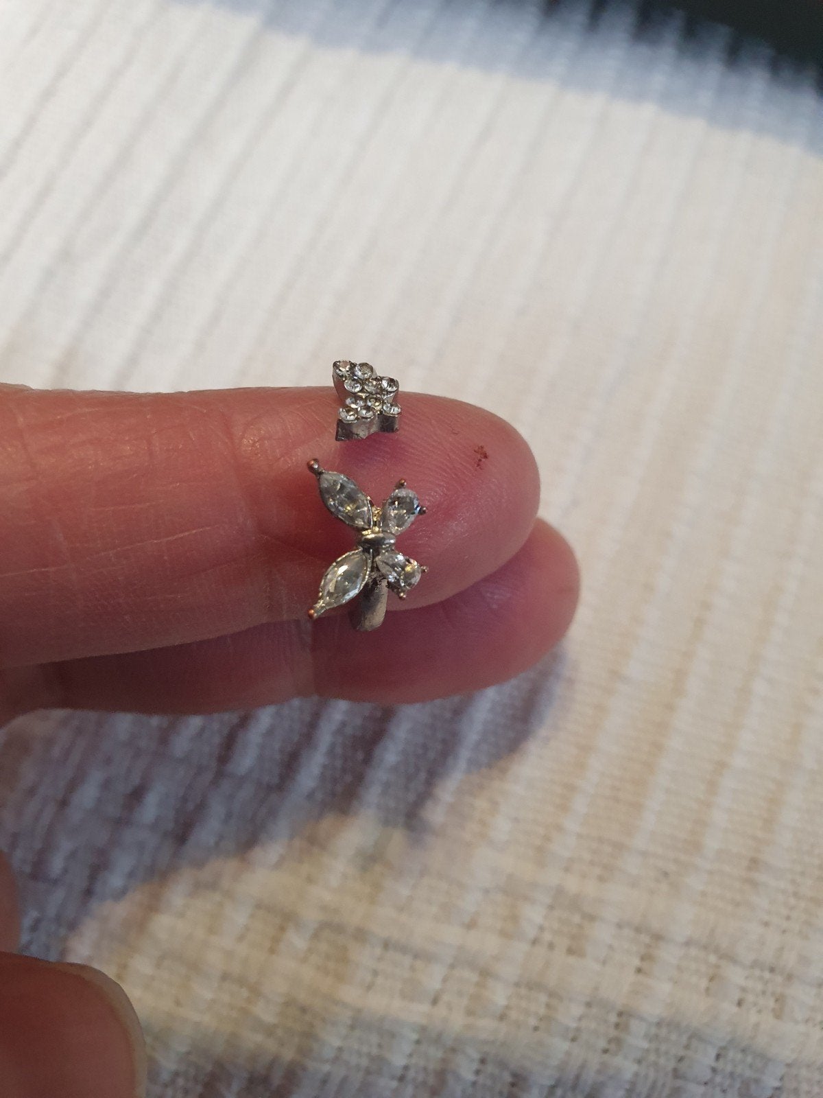 Verstelbare zilverkleurige ring met vlinder en steentjes, Overige materialen, Met strass, Ophalen of Verzenden, Zo goed als nieuw