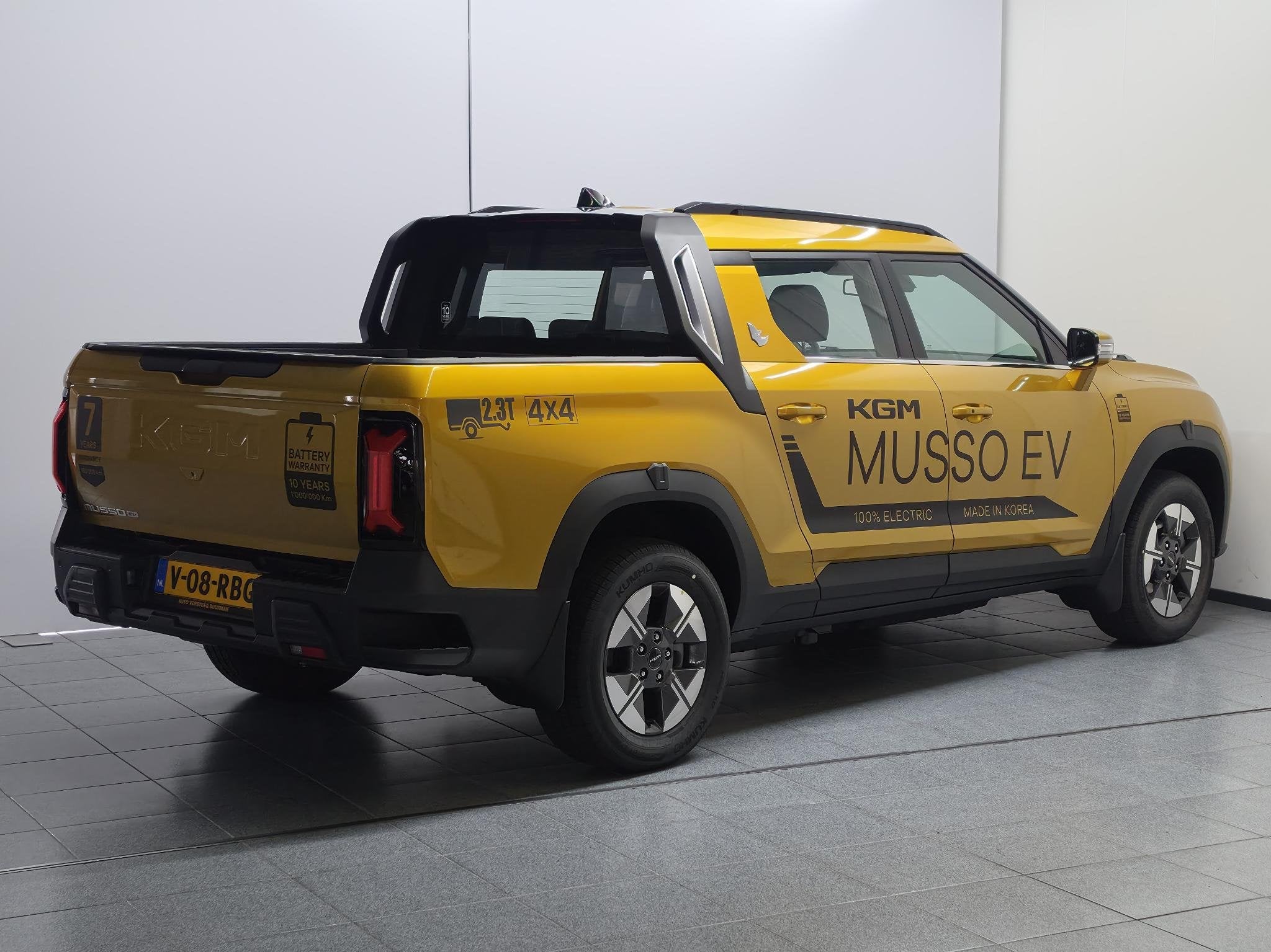 KGM Musso EV Platinum 80.6 kWh 4WD, 2300 KG Trekgewicht, Lux, Auto's, Overige Auto's, Zwart, 2260 kg, Origineel Nederlands, Parkeercamera
