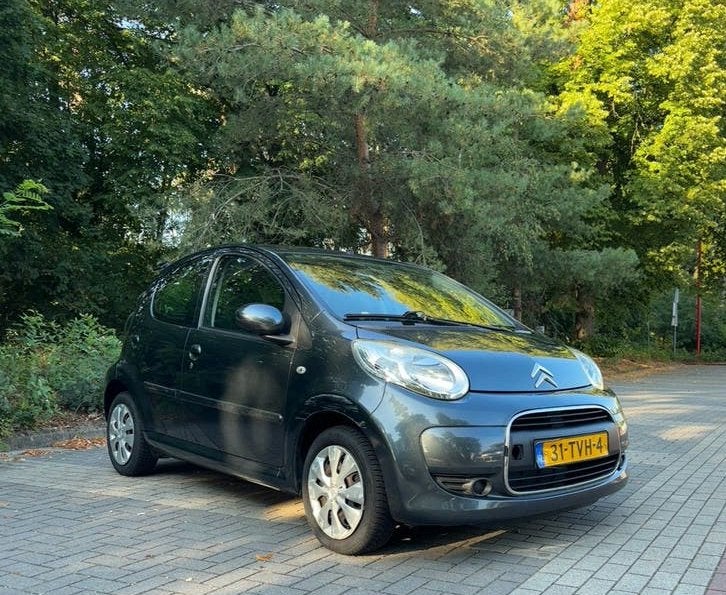 Citroën C1 1.0i 68PK 5D 2012 | 90.602 KM, Voorwielaandrijving, Euro 5, Stof, Zwart