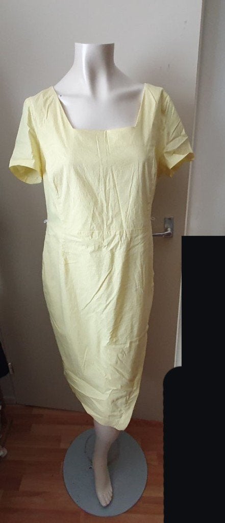 Gele jurk Promiss maat 42, Geel, Maat 42/44 (L), Ophalen of Verzenden, Knielengte