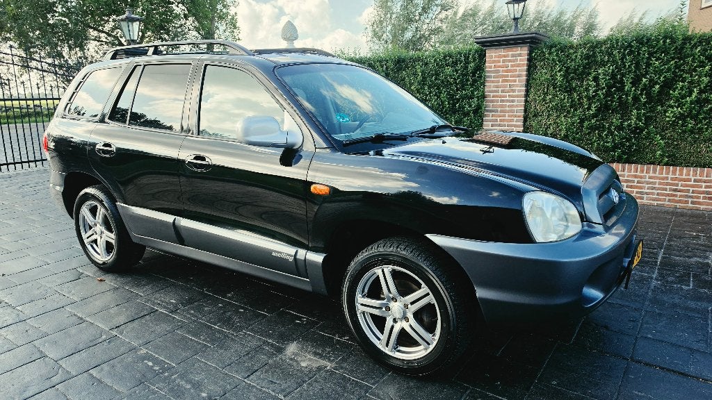 Hyundai Santa Fe 2.4 I 16V Leder ecc APK+NAP inruil mogelijk, Auto's, Voorwielaandrijving, 145 pk, Santa Fe, 4 cilinders